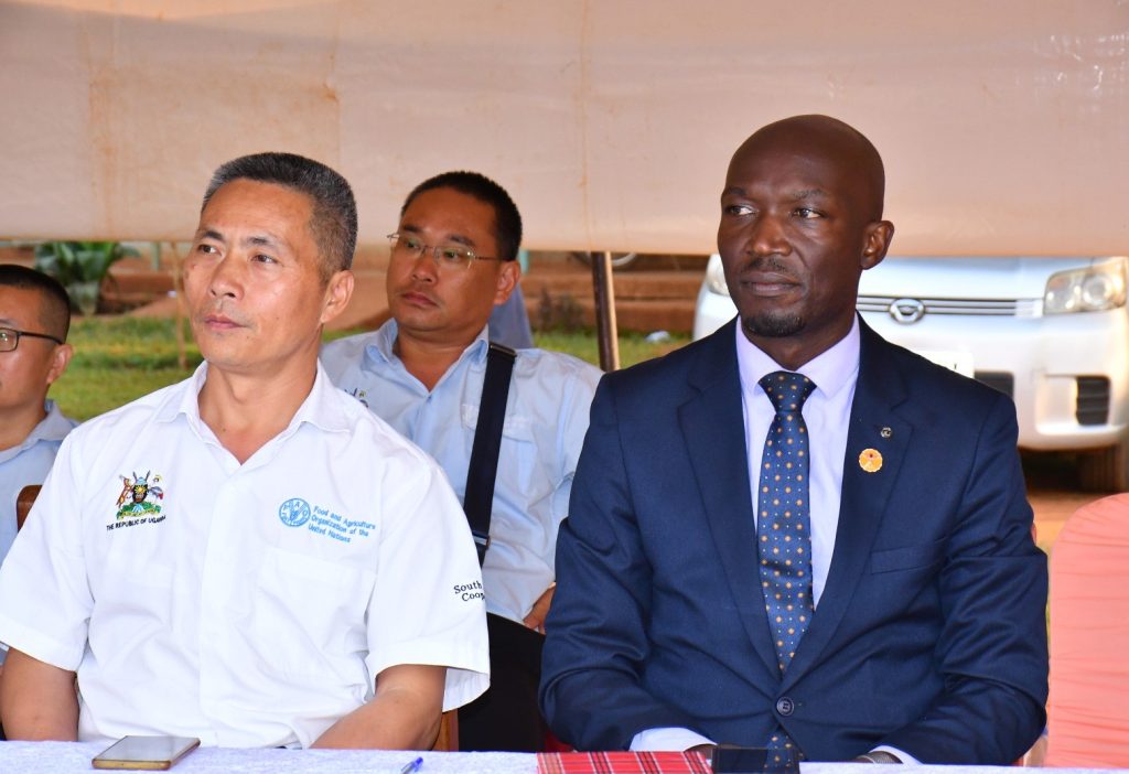 Busoga Consortium’s Director General Anthony Mula Zhang Xiaogiang the team leader FAO-China Uganda at South-South Cooperation project phase 3 