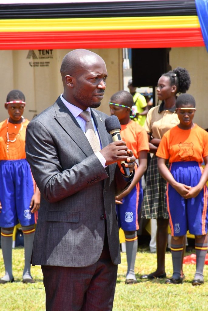 Mula Anthony the Director General Busoga Consortium For Development addressing the residents of Namayombe Village in Namayingo District.