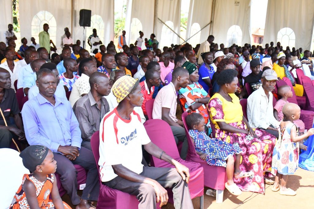 Resident attending the launch of  Young Rural Entrepreneurs’ Initiative and the Village Agricultural Model (VAM) Initiative at Majooga Primary School in Namayombe Village in Namayingo District.