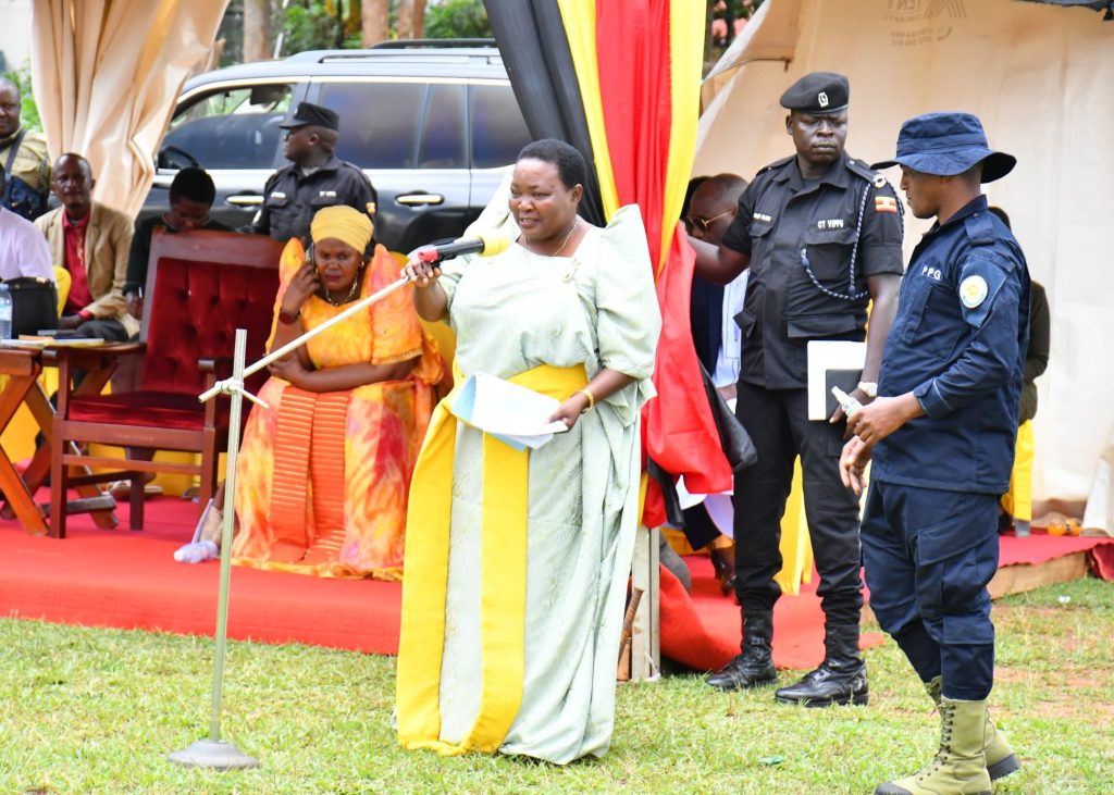 Rt. Hon. Robinah Nabbanja who represented H.E the President reads the speech to people at luuka grounds during the Regional Prayers