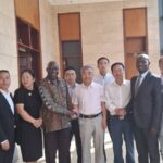 In the Photo Mr. Vincent Musubire (Deputy Principal Private Secretary to the Vice President of Uganda)(L), Mr. Liu Tong (Director General of the Sichuan Seed Association)(R), and Mr. Mula Anthony (Director General of the Busoga Consortium) with Sichuan Delegation.