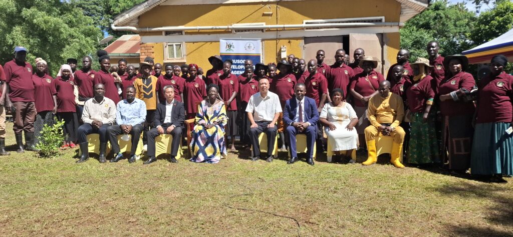 Greater Kamuli Agri Farmers Cooperative pose for a photo with Rt. Hon. Rebecca Kadaga and the special guests during the official launch of chili farming in Kamuli