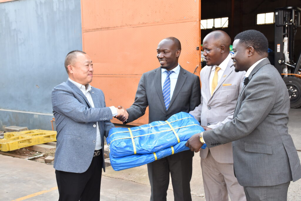 The donation was officially handed over by Mr. Zhu Xu Sheng, the Director and Manager of Sunbelt Industries, to Mr. Mula Anthony, the Director General of the Busoga Consortium, in the presence of Hon. Stephen Kisa, Member of Parliament  for Luuka South, and Counsel Buwande Anthony Legal Advisor BCD. 