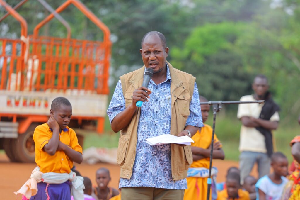 Hon. Stephen Kisa Bakubalwayo, Chairperson of the Busoga Parliamentary Caucus at Buteme Light SDA Primary School during official monitoring visit of FAO Country Representative to Busana Model Village in Kamuli District. 